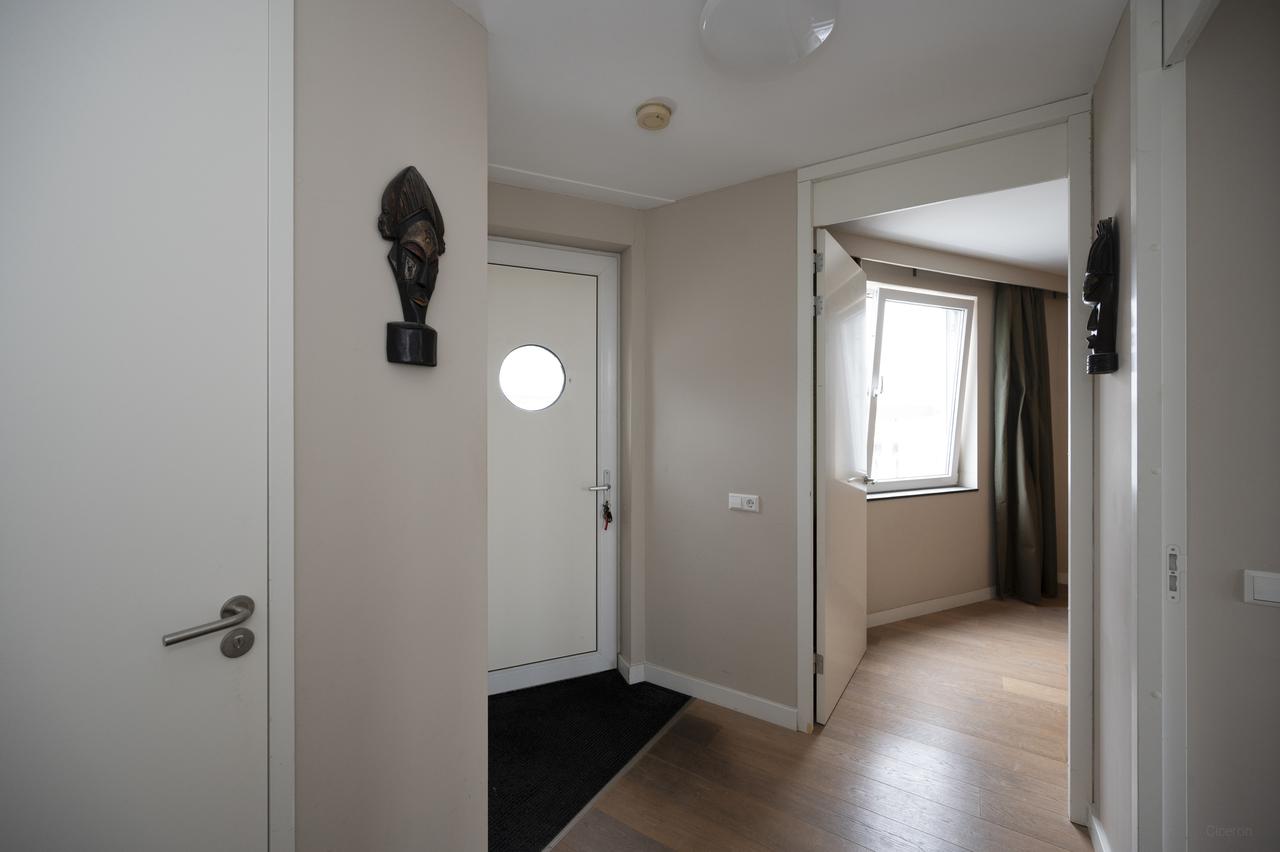 Licht 2-kamerappartement met balkon in Oostpoort - Afbeelding 9