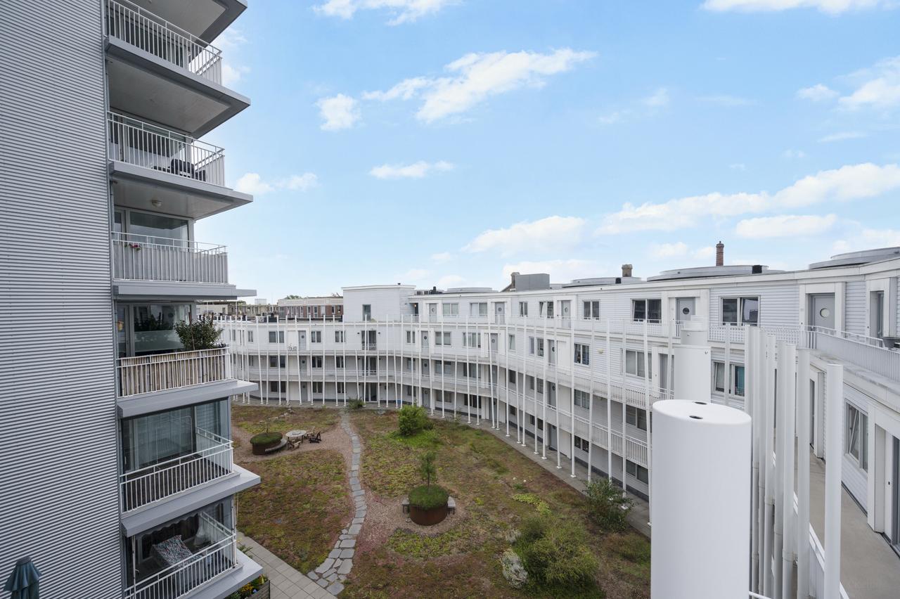 Licht 2-kamerappartement met balkon in Oostpoort - Afbeelding 19