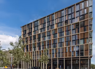 Appartement naast Amstel Station met dakterras