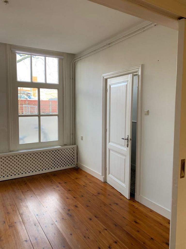 Benedenwoning met tuin vlak bij station - Afbeelding 3