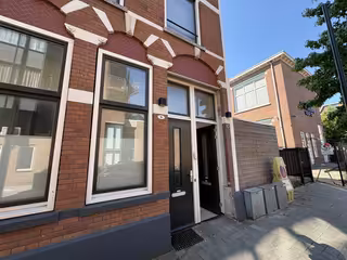 Dakterras en parkeerplek in Oude Westen