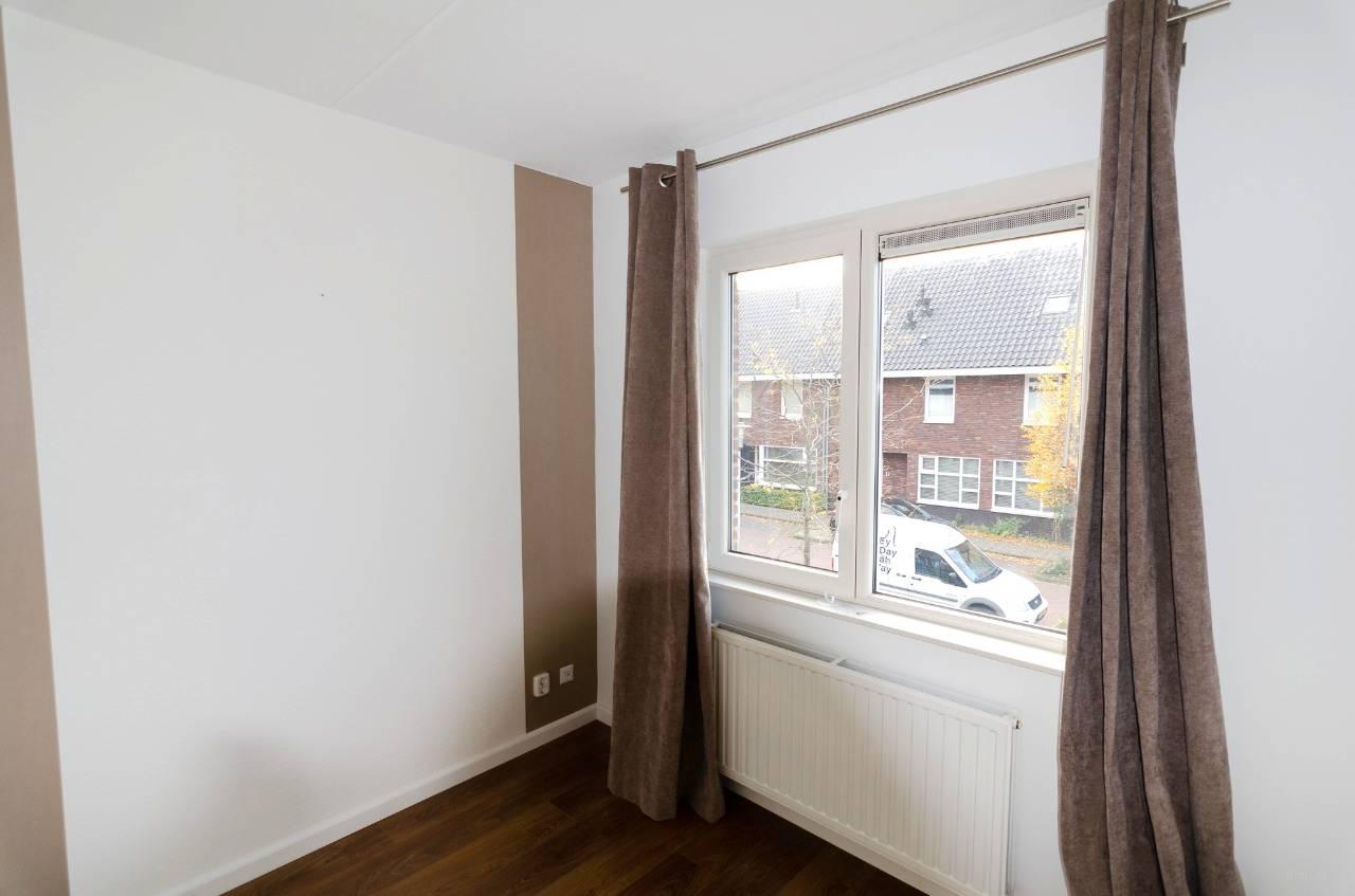 Comfortabele tussenwoning vlak bij centrum - Afbeelding 2