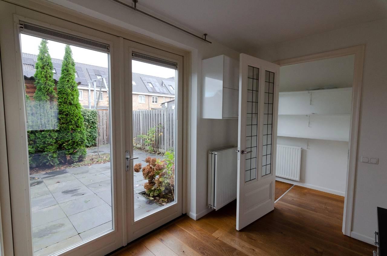 Comfortabele tussenwoning vlak bij centrum - Afbeelding 12