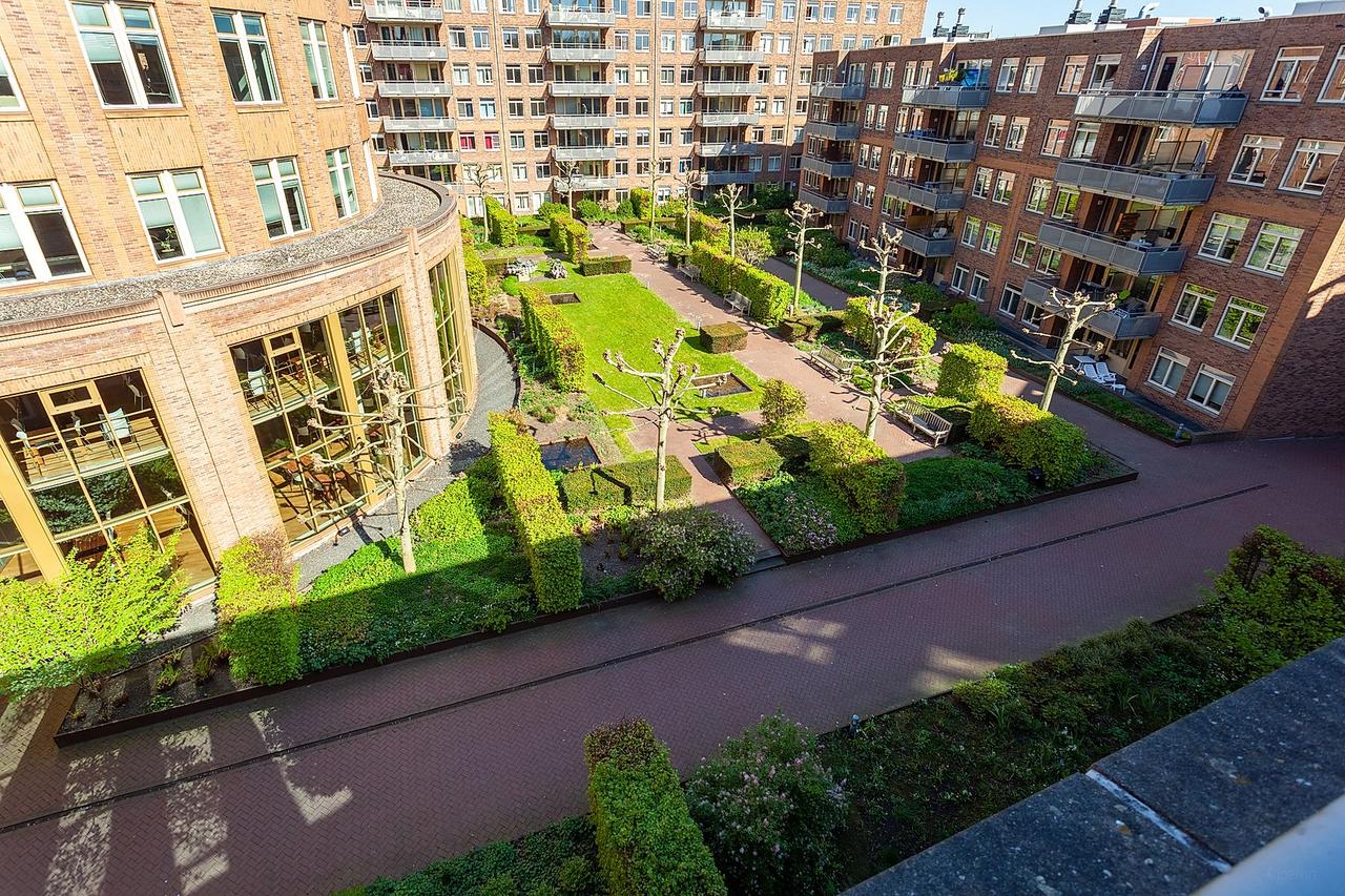Terras aan de binnentuin in Bezuidenhout - Afbeelding 4