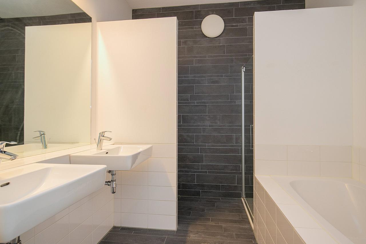 Appartement op de 27e etage in Kop van Zuid - Afbeelding 11