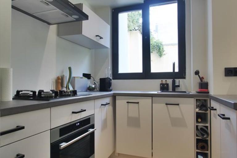 Benedenwoning met zonnige tuin in de Jordaan - Afbeelding 17