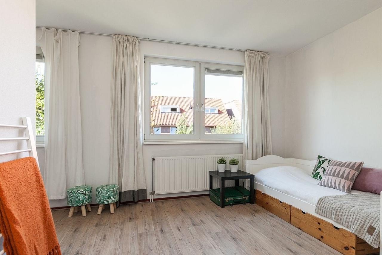110 m² tussenwoning met zonnige westtuin - Afbeelding 8