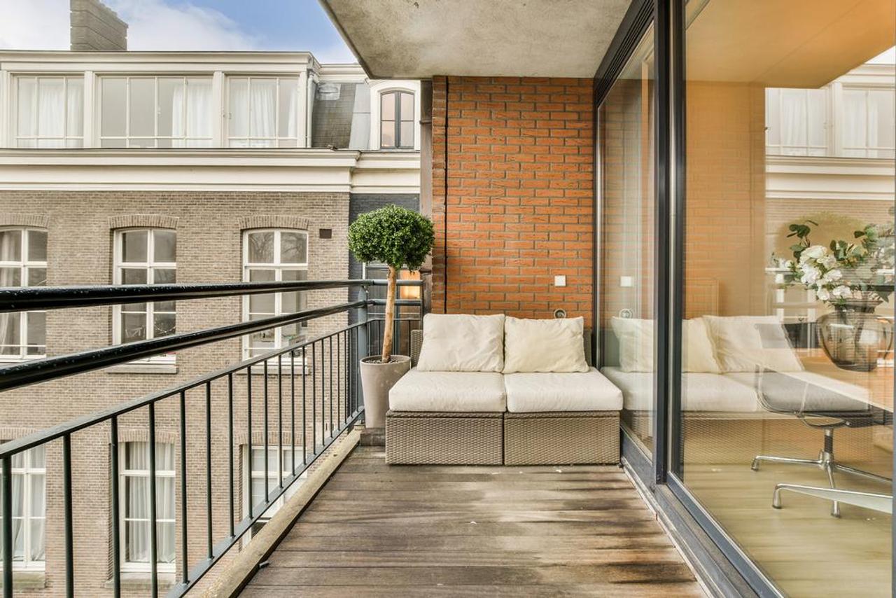 Zonnig terras en lift aan de Sarphatistraat - Afbeelding 7