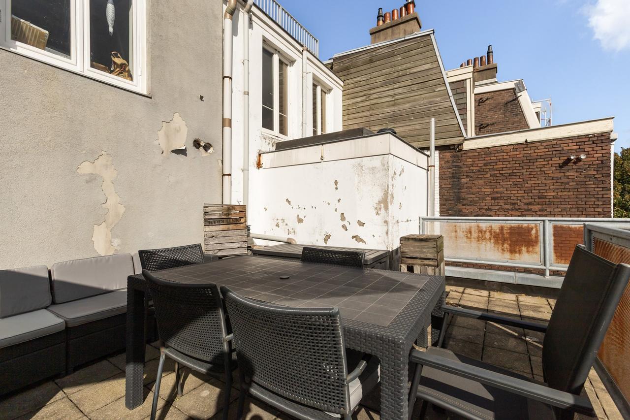 Drie woonlagen en dakterras in de Jordaan - Afbeelding 22