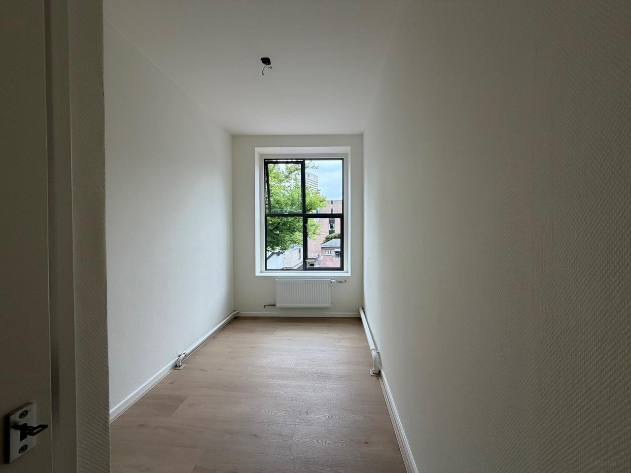Centraal wonen met balkon en werkkamer - Afbeelding 24