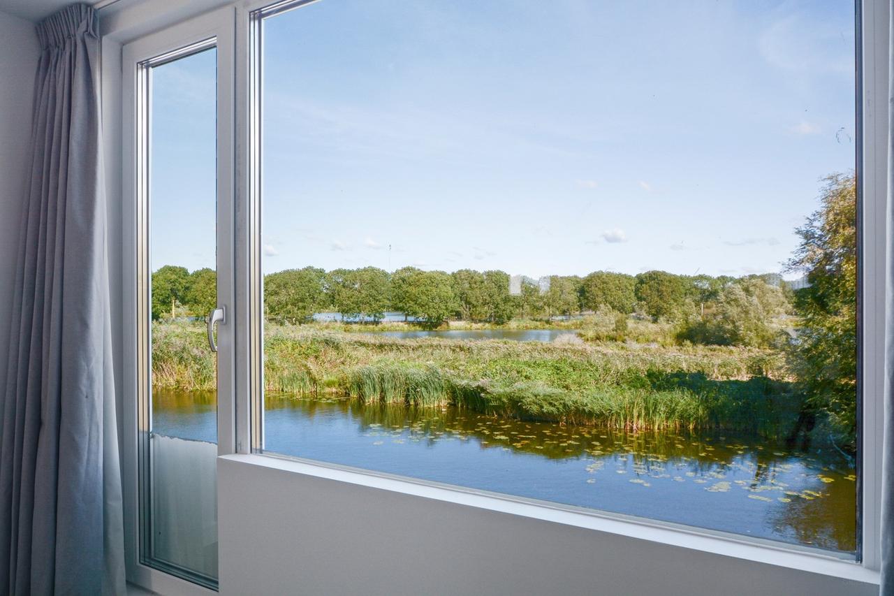 Detached Waterfront Living in Amsterdam - Image 48