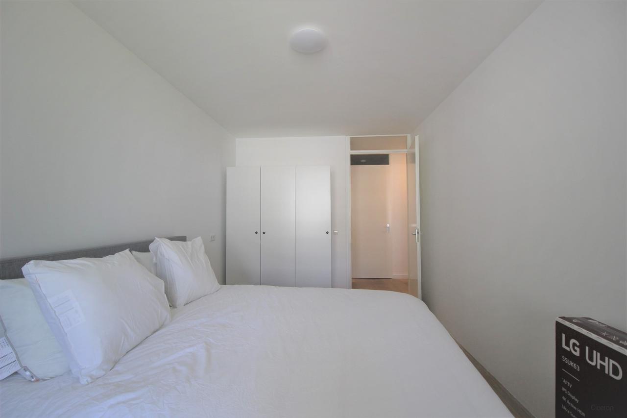 Furnished 2-Bedroom Apartment with Balcony - Image 13