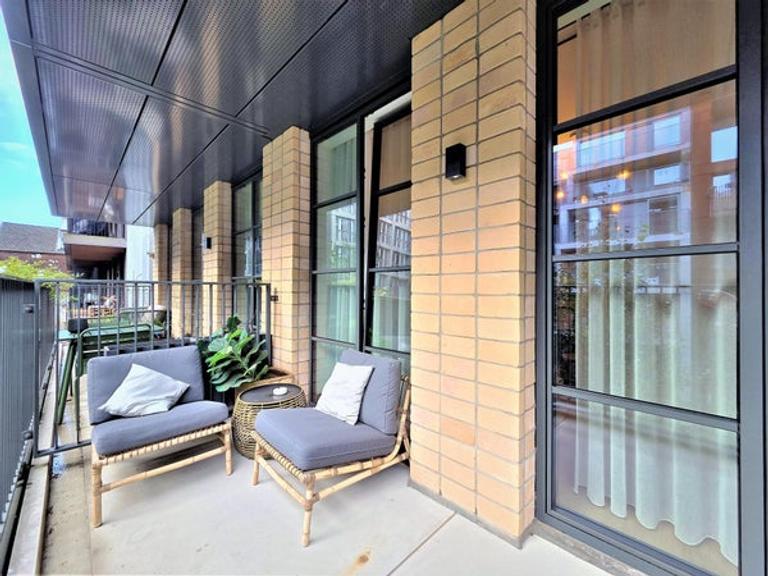 Furnished 1-Bedroom Apartment with Balcony - Image 5