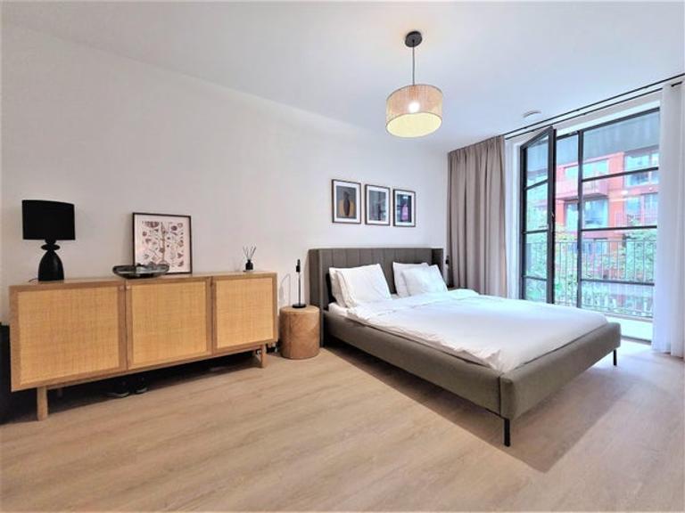 Furnished 1-Bedroom Apartment with Balcony - Image 10