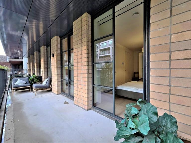 Furnished 1-Bedroom Apartment with Balcony - Image 12