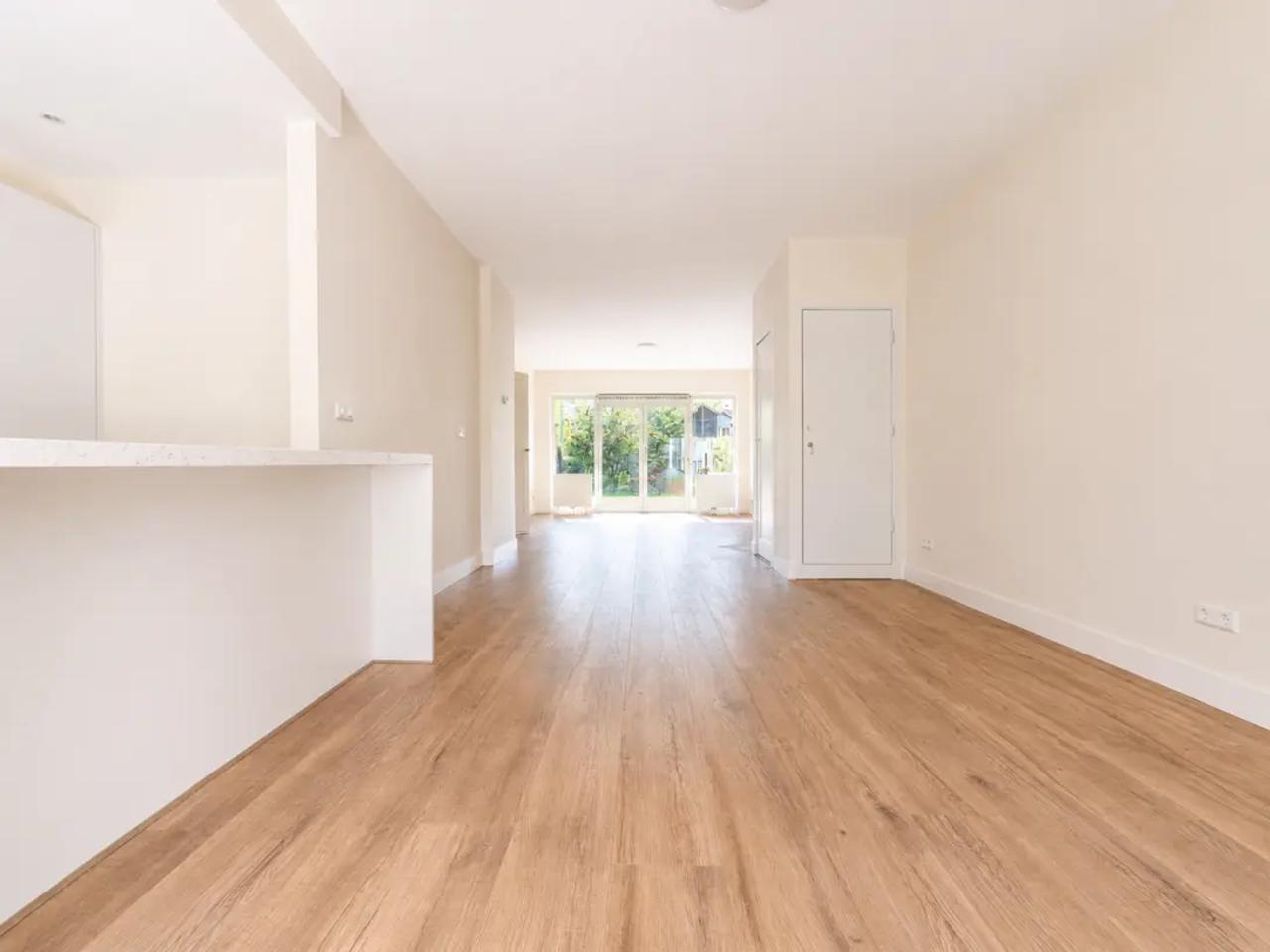 124 m² woonruimte met drie slaapkamers en tuin - Afbeelding 1