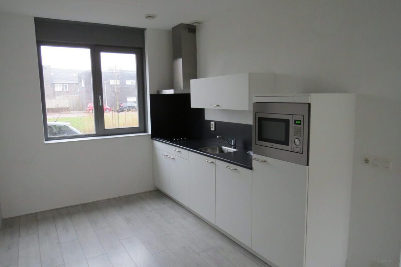 Hoekwoning met 4 slaapkamers en tuin - Afbeelding 3