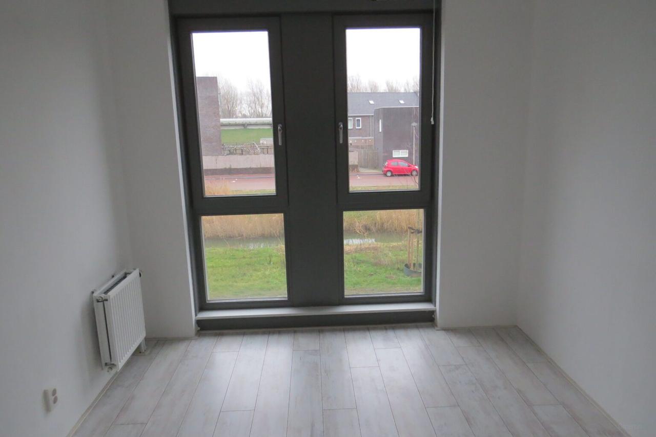 Hoekwoning met 4 slaapkamers en tuin - Afbeelding 8