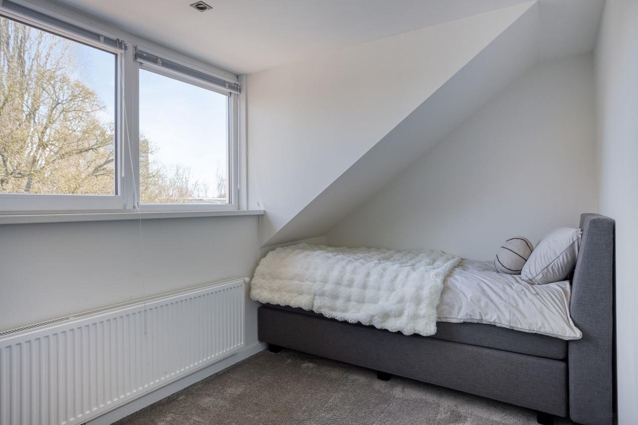 130 m² familiehuis met vier slaapkamers - Afbeelding 25