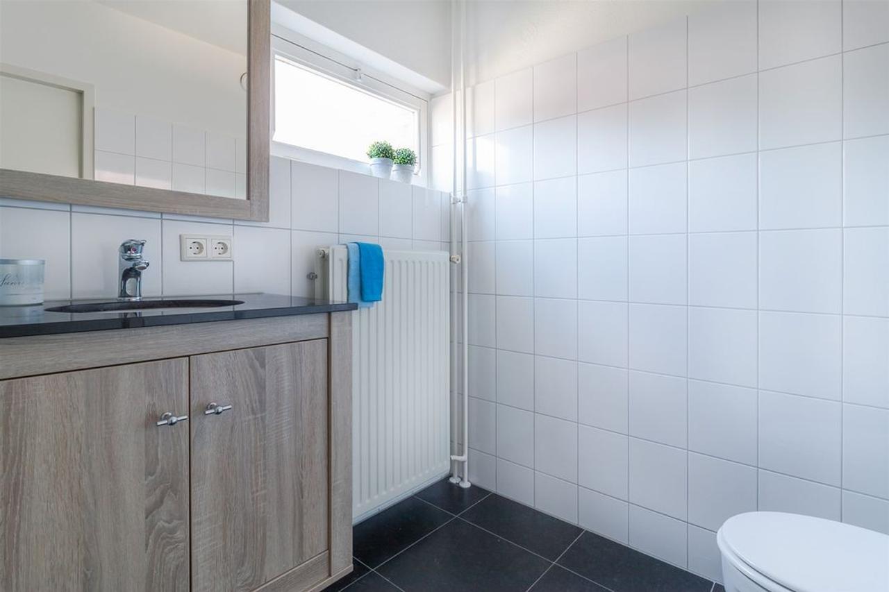 Rustig wonen met carport en drie slaapkamers - Afbeelding 7