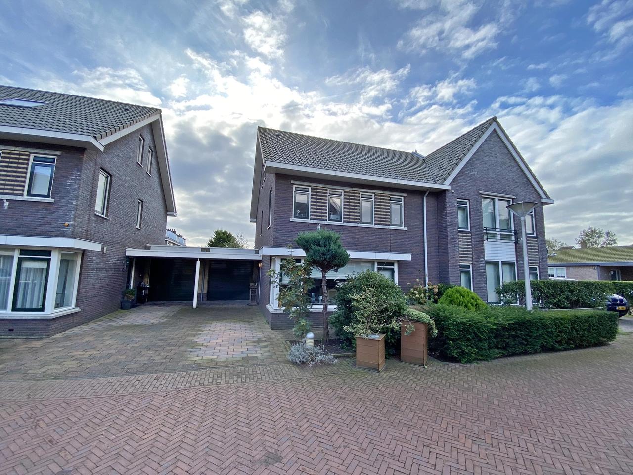 185 m² woonruimte met zonnige tuin en garage - Afbeelding 5