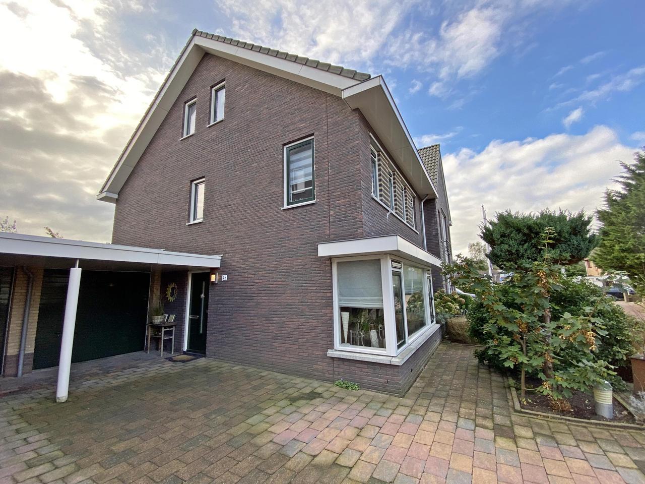 185 m² woonruimte met zonnige tuin en garage - Afbeelding 6