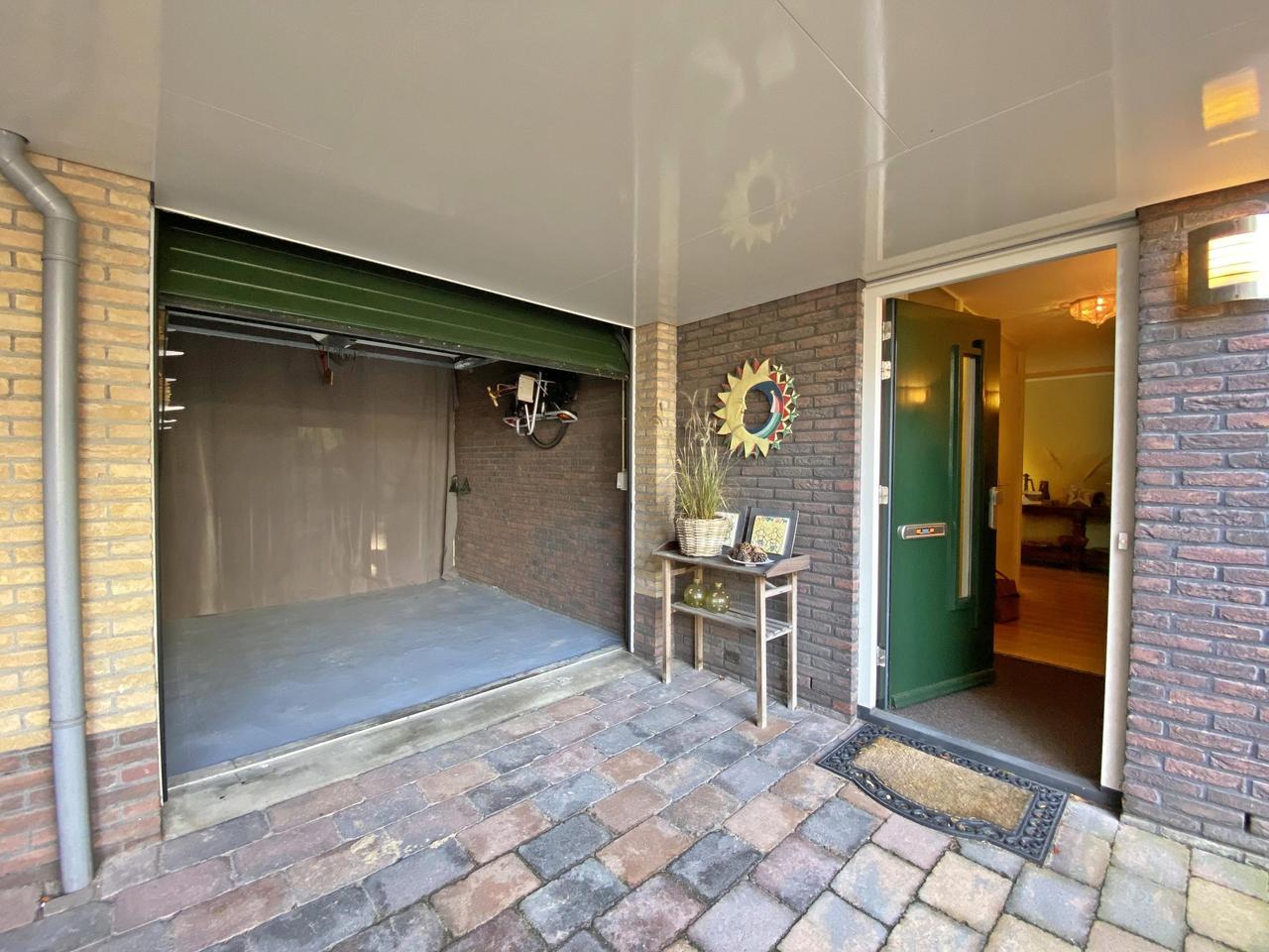185 m² woonruimte met zonnige tuin en garage - Afbeelding 7