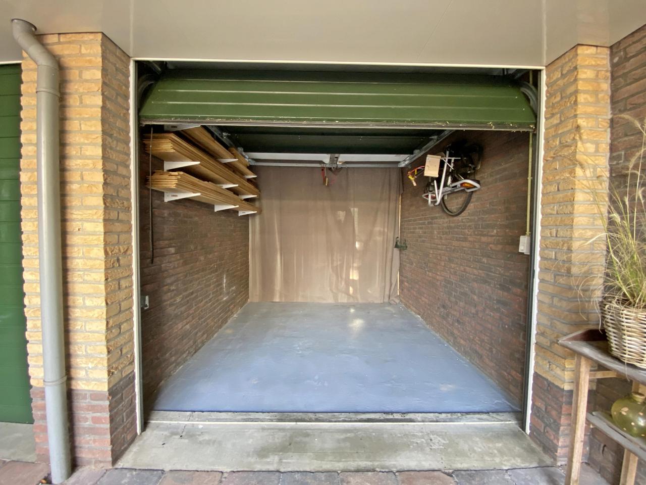 185 m² woonruimte met zonnige tuin en garage - Afbeelding 8