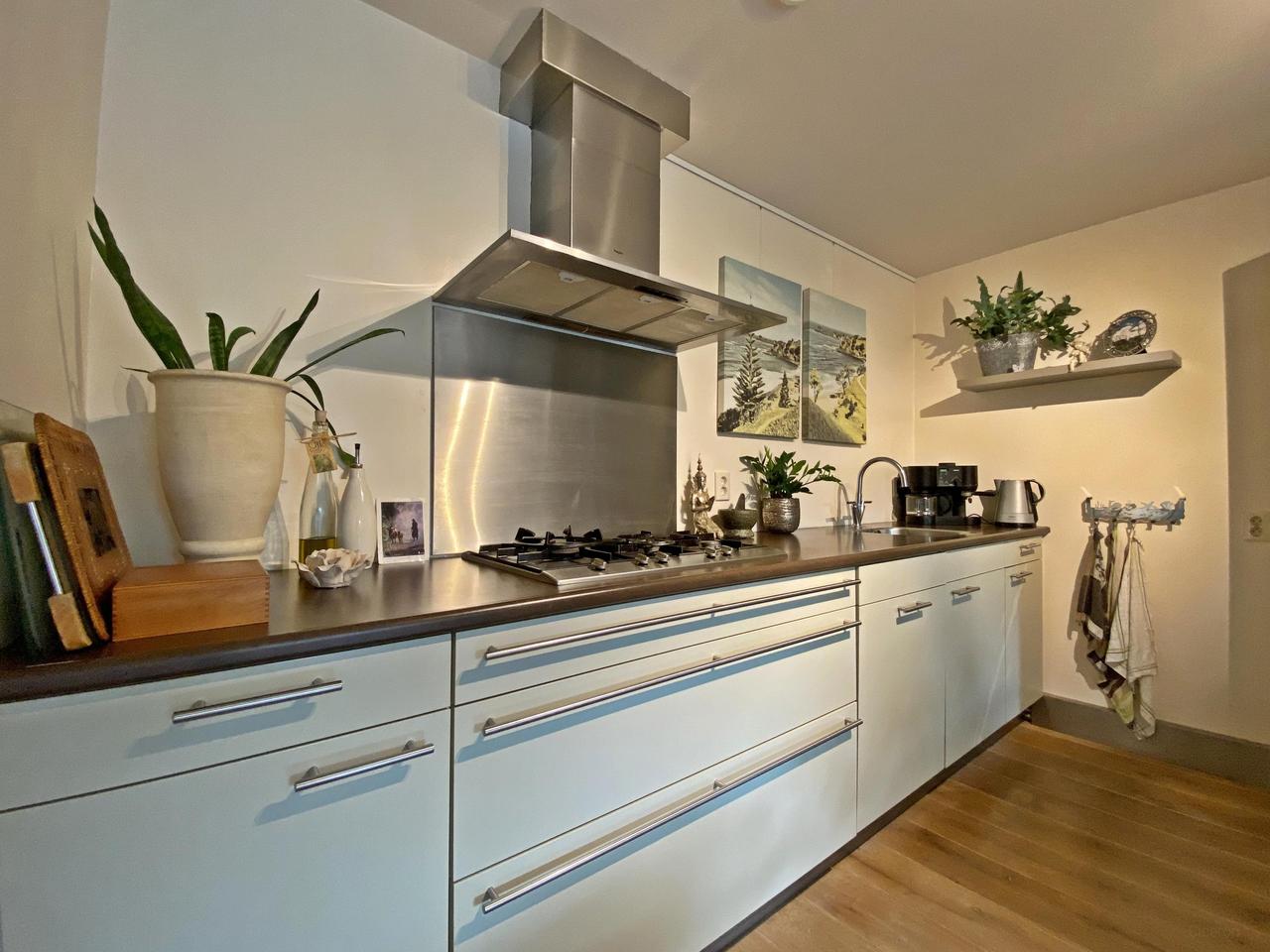 185 m² woonruimte met zonnige tuin en garage - Afbeelding 15