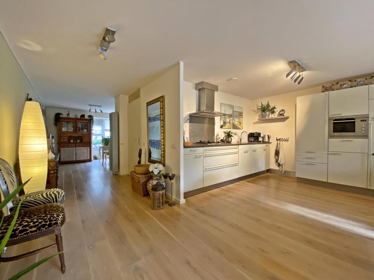185 m² woonruimte met zonnige tuin en garage - Afbeelding 20