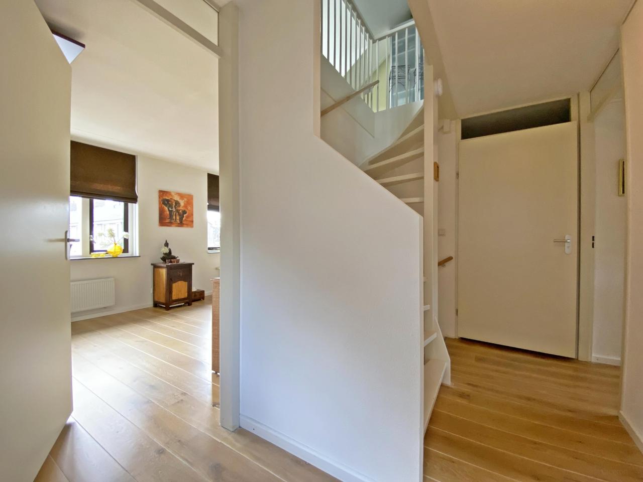 185 m² woonruimte met zonnige tuin en garage - Afbeelding 33