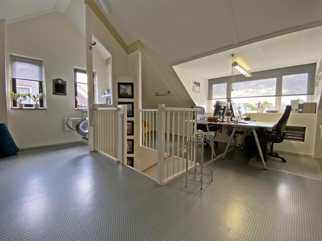 185 m² woonruimte met zonnige tuin en garage - Afbeelding 34