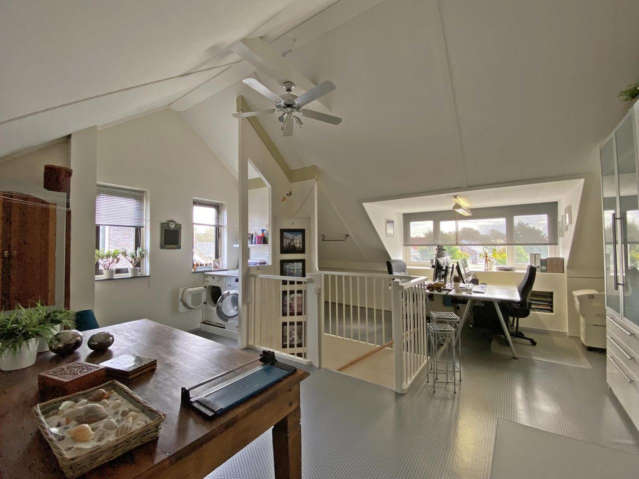 185 m² woonruimte met zonnige tuin en garage - Afbeelding 35