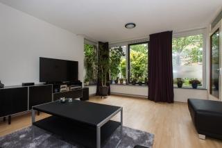 100 m² gemeubileerd met tuin en parkeerplek - Afbeelding 2