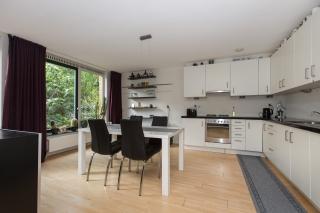 100 m² gemeubileerd met tuin en parkeerplek - Afbeelding 6