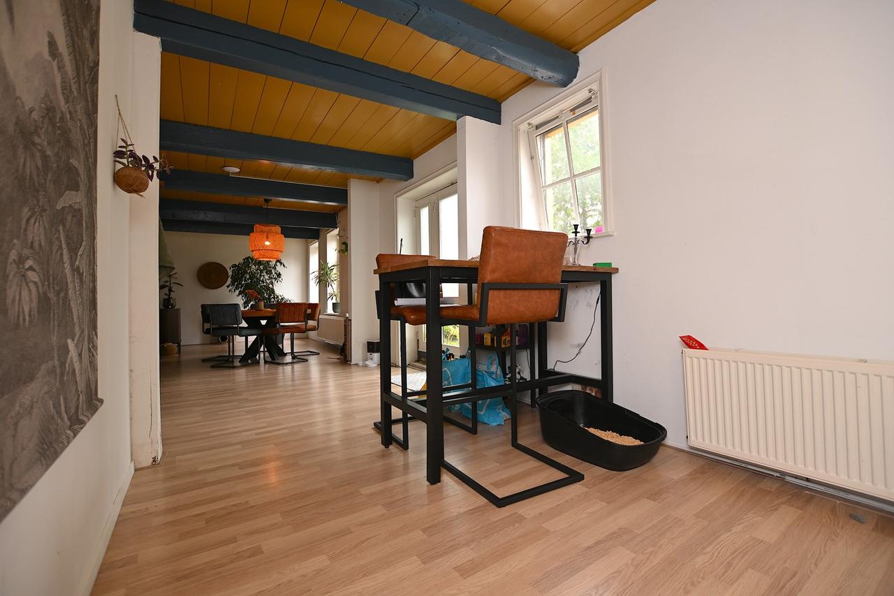 100 m² met twee slaapkamers en tuin - Afbeelding 11