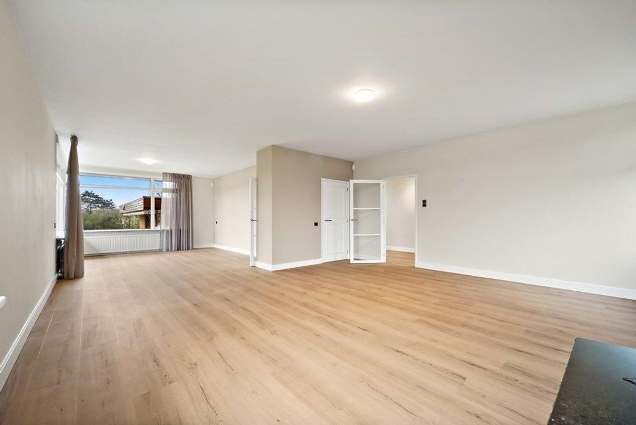 183 m² 2-onder-1-kapwoning met tuin in Kijkduin - Afbeelding 1