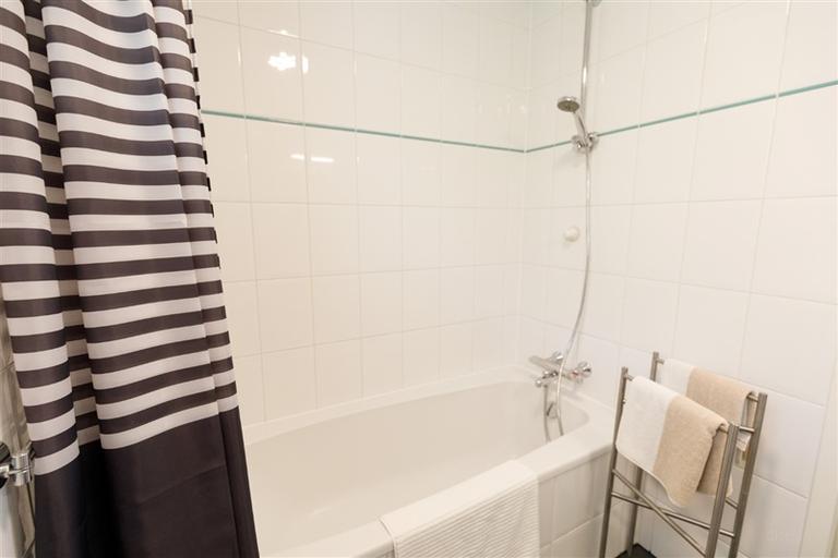 130 m², vier slaapkamers en een tuin - Afbeelding 20