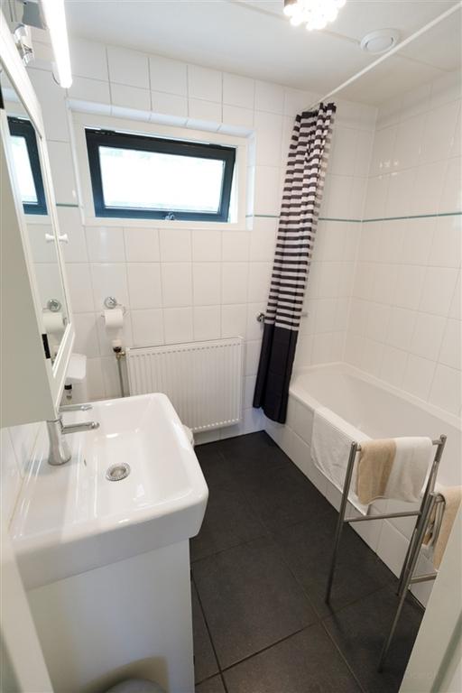 130 m², vier slaapkamers en een tuin - Afbeelding 21