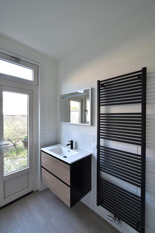 Appartement (52m²) met eigen tuin in Tarwewijk - Afbeelding 11
