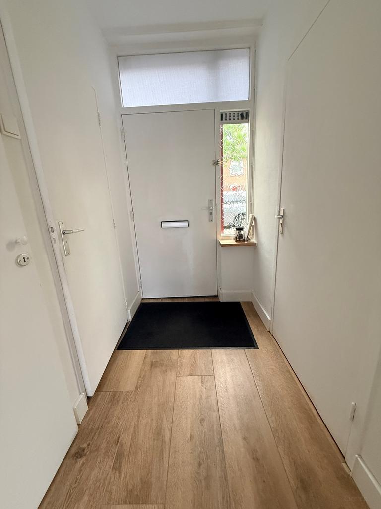 Rijtjeshuis met 4 slaapkamers en tuin in De Schutskamp - Afbeelding 2