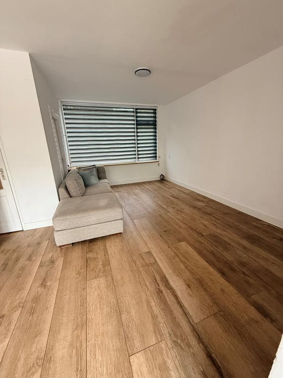 Rijtjeshuis met 4 slaapkamers en tuin in De Schutskamp - Afbeelding 4