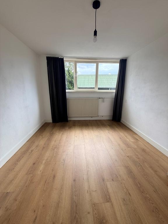 Rijtjeshuis met 4 slaapkamers en tuin in De Schutskamp - Afbeelding 13