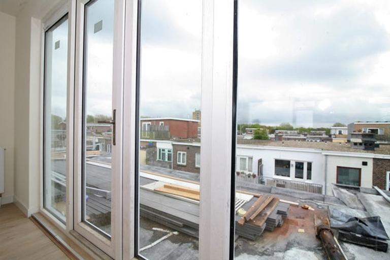 Gerenoveerd appartement met zonneterras in Den Haag - Afbeelding 4