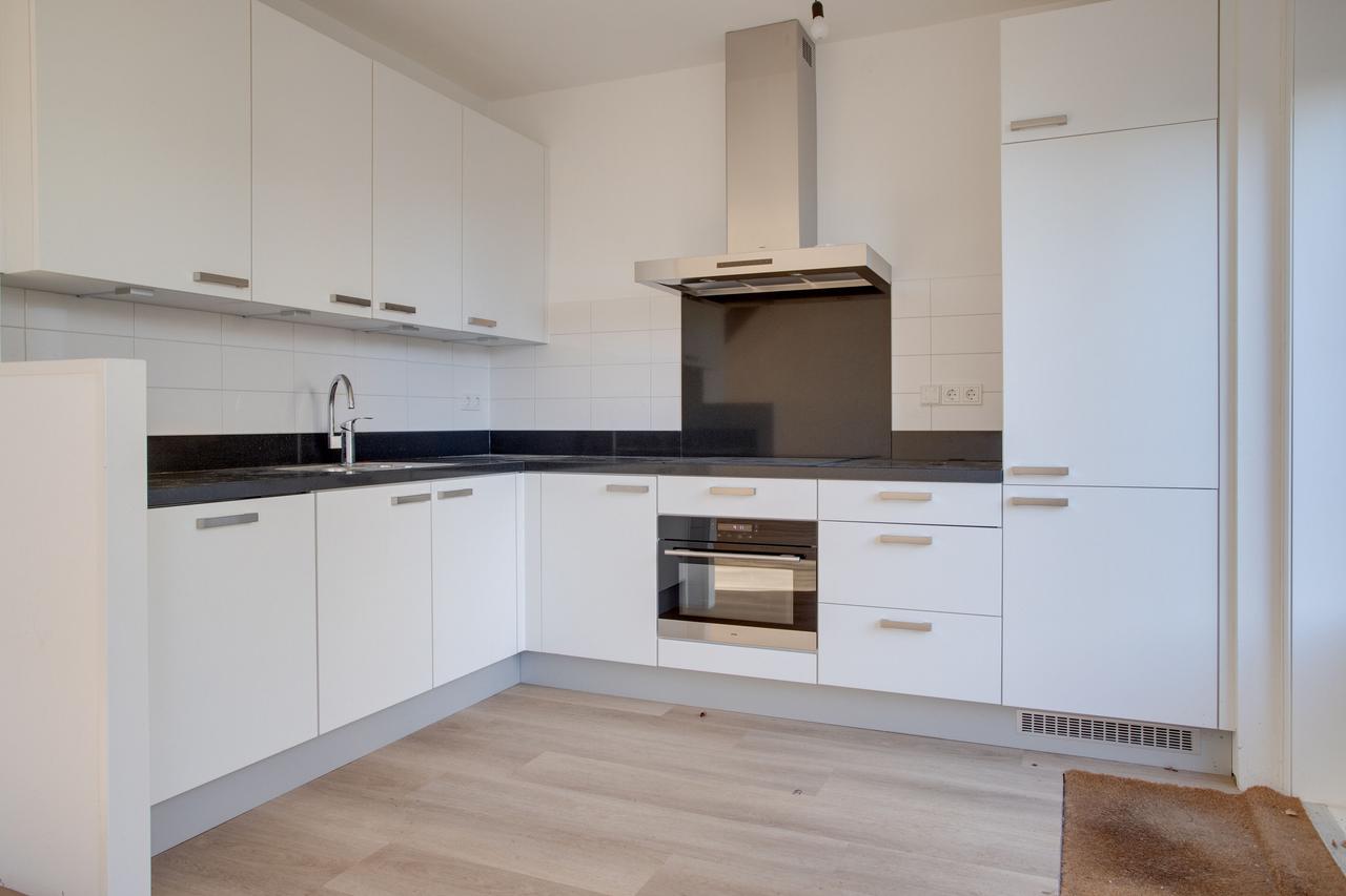 95 m² met vier slaapkamers en eigen tuin - Afbeelding 2