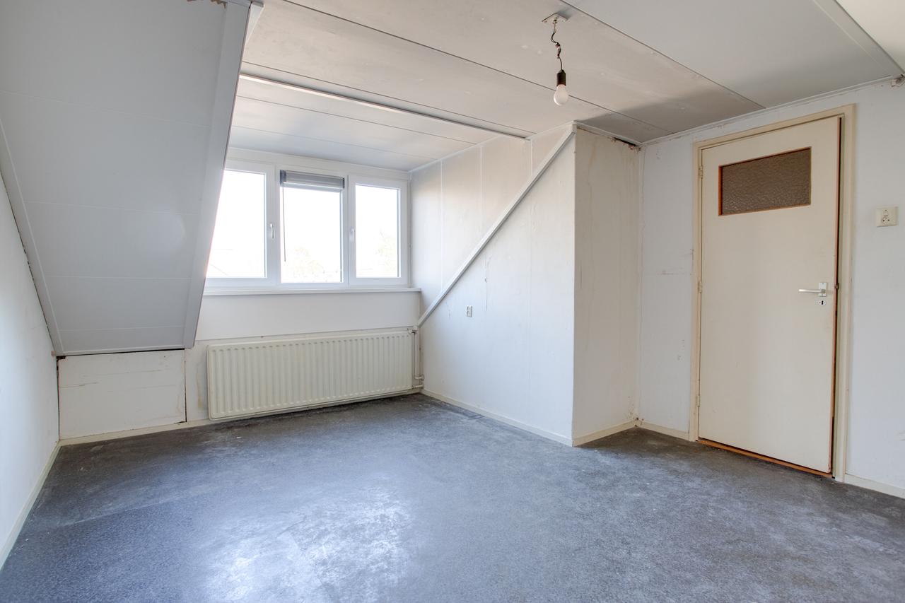 95 m² met vier slaapkamers en eigen tuin - Afbeelding 13