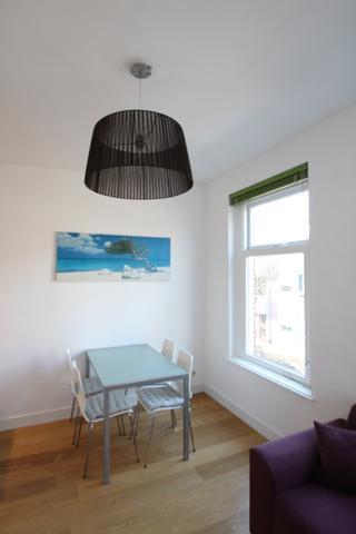 Gemeubileerd 2-kamerappartement met dakterras - Afbeelding 4