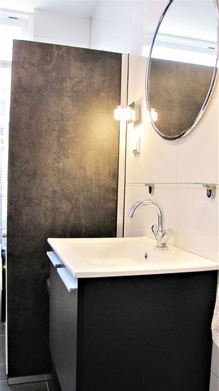 Furnished 1-Bedroom Apartment with Garden - Image 11