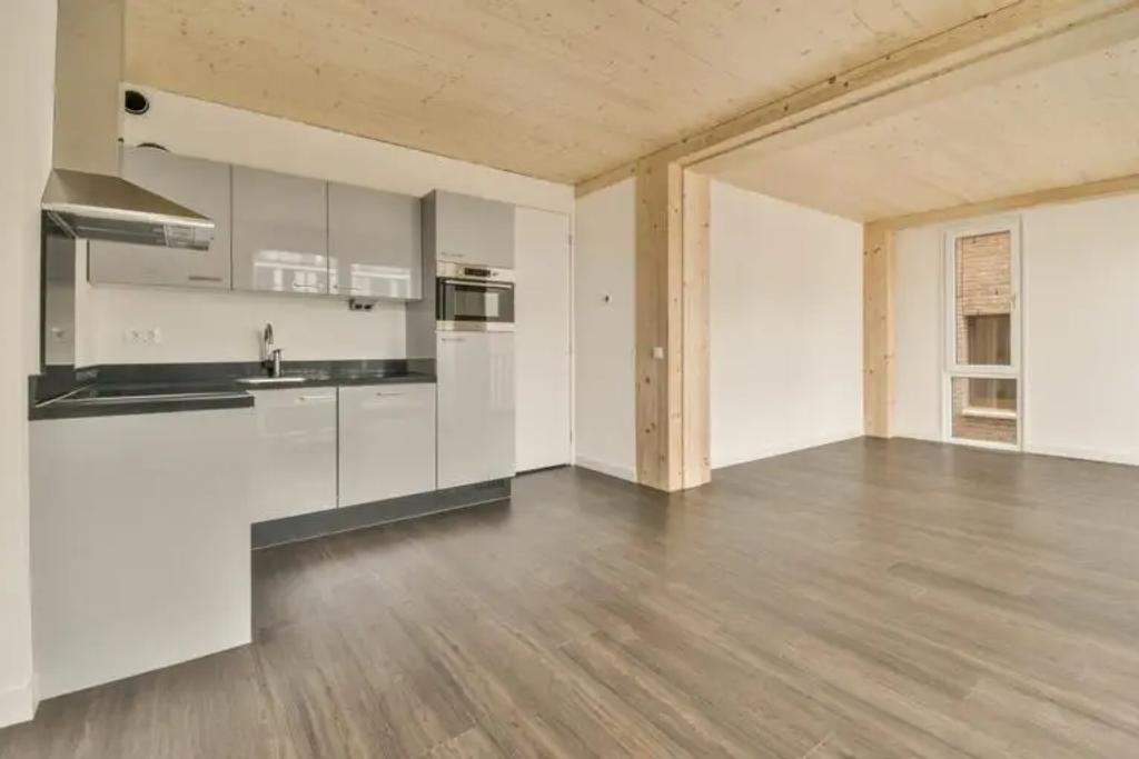 Wooden 2-Bedroom Apartment with South-Facing Balcony - Image 2