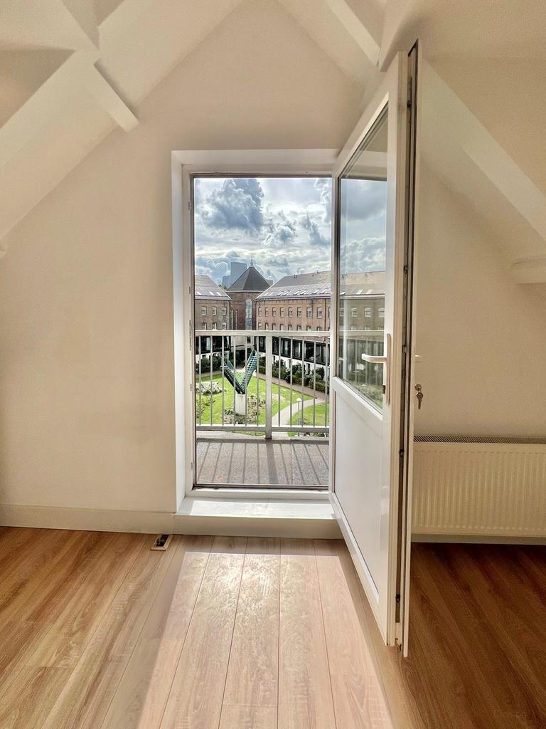 2-slaapkamerappartement met balkon in Oude Noorden - Afbeelding 3